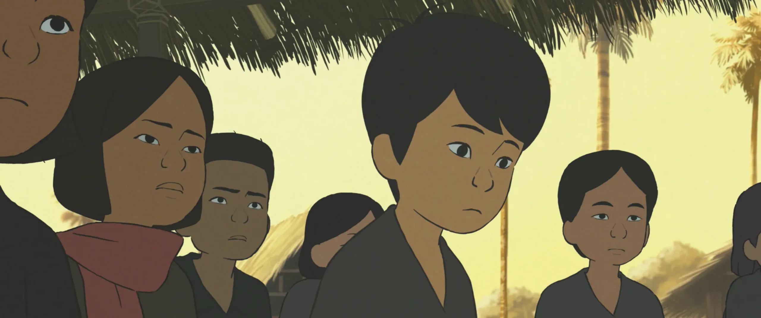 Groupe d'enfants sous un abri de chaume, film d'animation Funan de Denis Do
